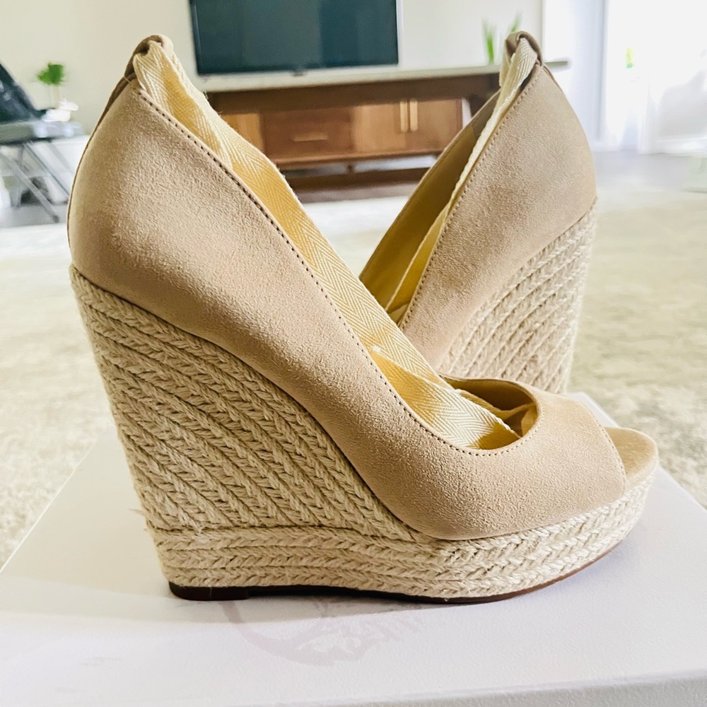I am selling size 7, color almond, Jessica Simpson wedge heels.